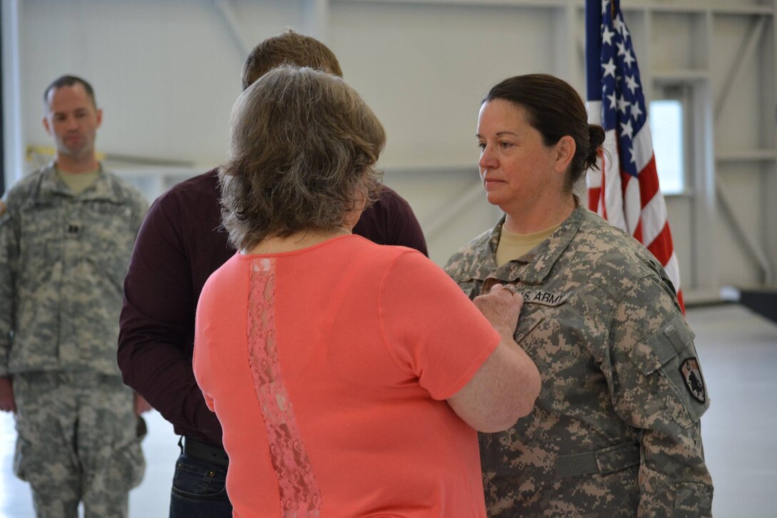 Motley, a Blackhawk pilot became the first female in the Kentucky Guard to earn the highest warrant officer rank.