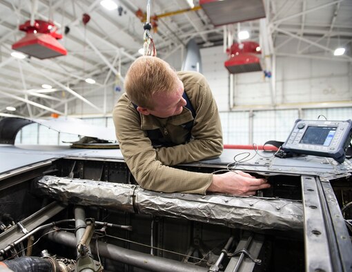 U.S. Air Force Staff Sgt. Ryan Cherry, Non-Destructive Inspection Craftsman, 133rd Maintenance Group, use an Olympus Nortec 600 to detect cracks on a C-130 Hercules in St. Paul, Minnesota, Mar. 16, 2021.