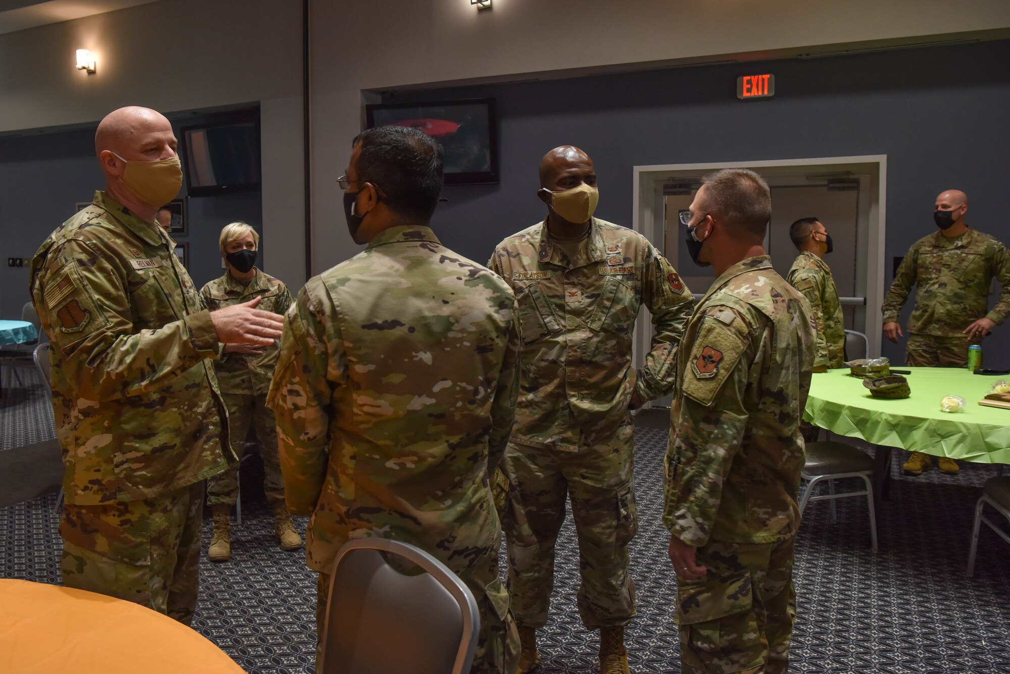 U.S. Air Force Col. Matthew Reilman, 17th Training Wing commander, and Col. James Finlayson, 17th TRW vice commander, interact with members at the Care for the Caregivers event on Goodfellow Air Force Base, Texas, Aug. 5, 2021. Members were also able to enjoy time with each other and engage with leadership in a casual atmosphere. (U.S. Air Force photo by Senior Airman Jermaine Ayers)