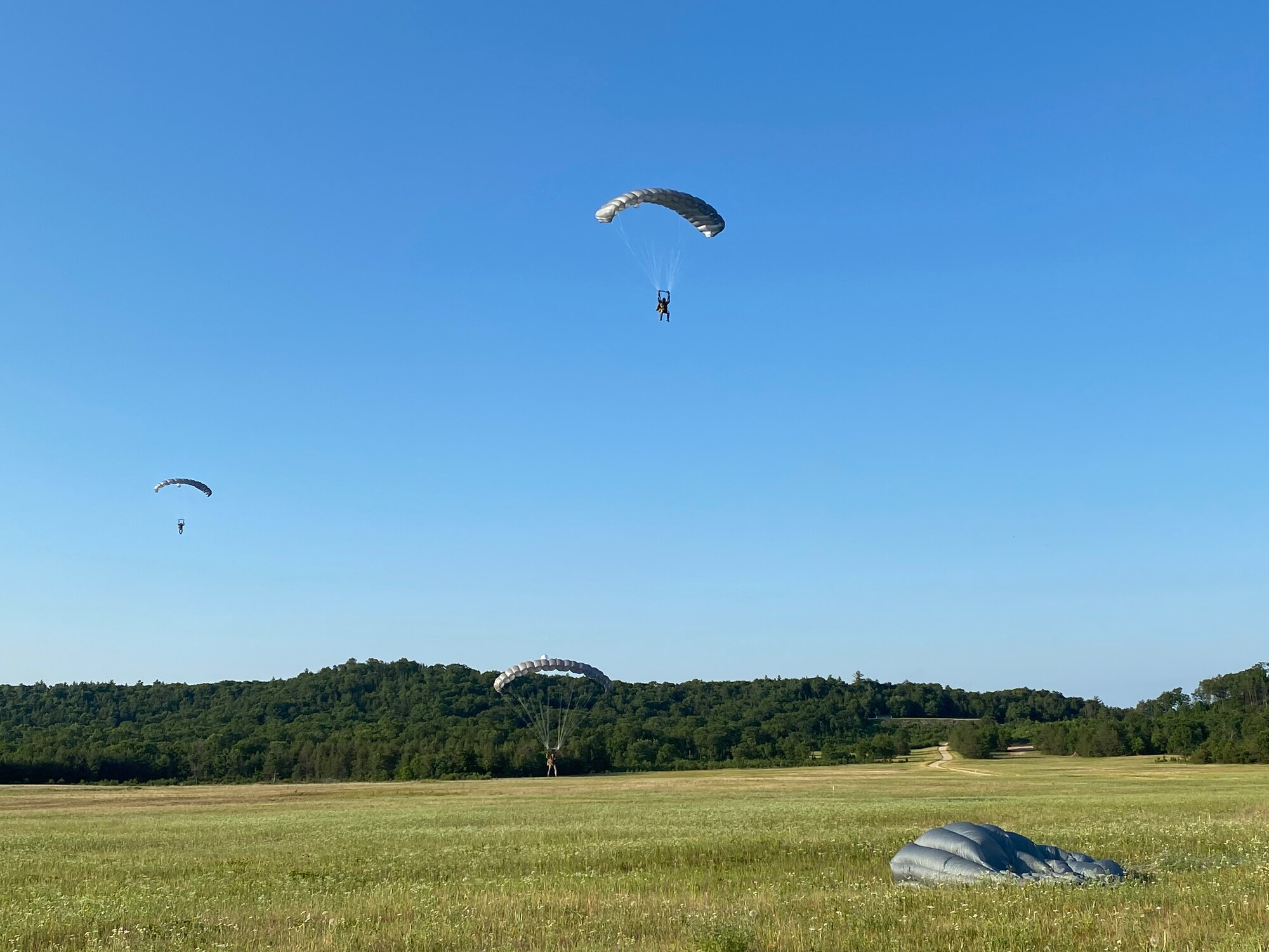 Special Operations personnel from the 26STS jumped from a C-130 assigned to the 133rd Airlift Wing, Minnesota Air National Guard onto the Warrens and Badger Drop Zones at Fort McCoy, Wis., during a joint Close Air Support training mission on June 23, 2021.