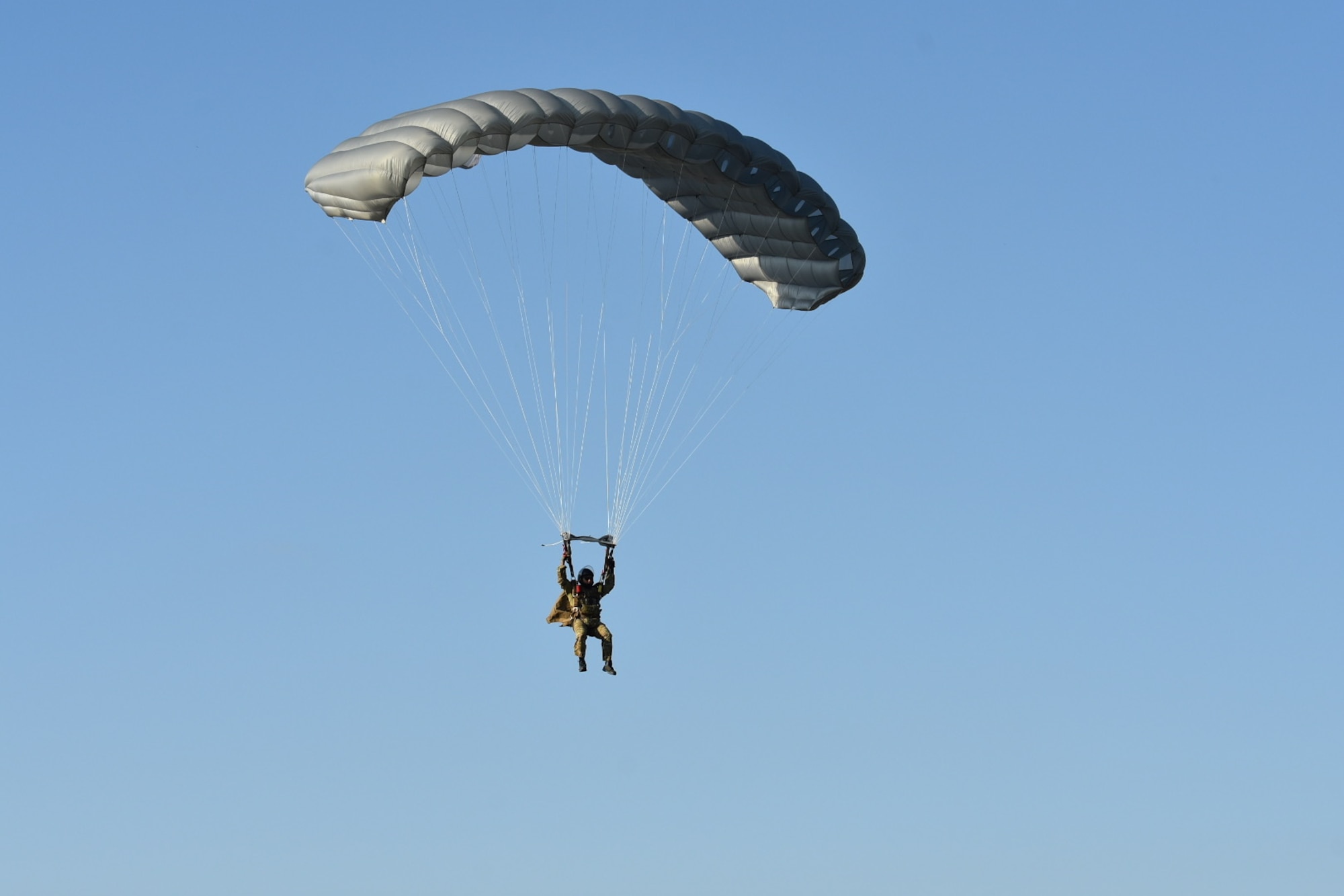 A Special Operations Airman from the 26STS jumped from a C-130 assigned to the 133rd Airlift Wing, Minnesota Air National Guard onto the Warrens and Badger Drop Zones at Fort McCoy, Wis., during a joint Close Air Support training mission on June 23, 2021.