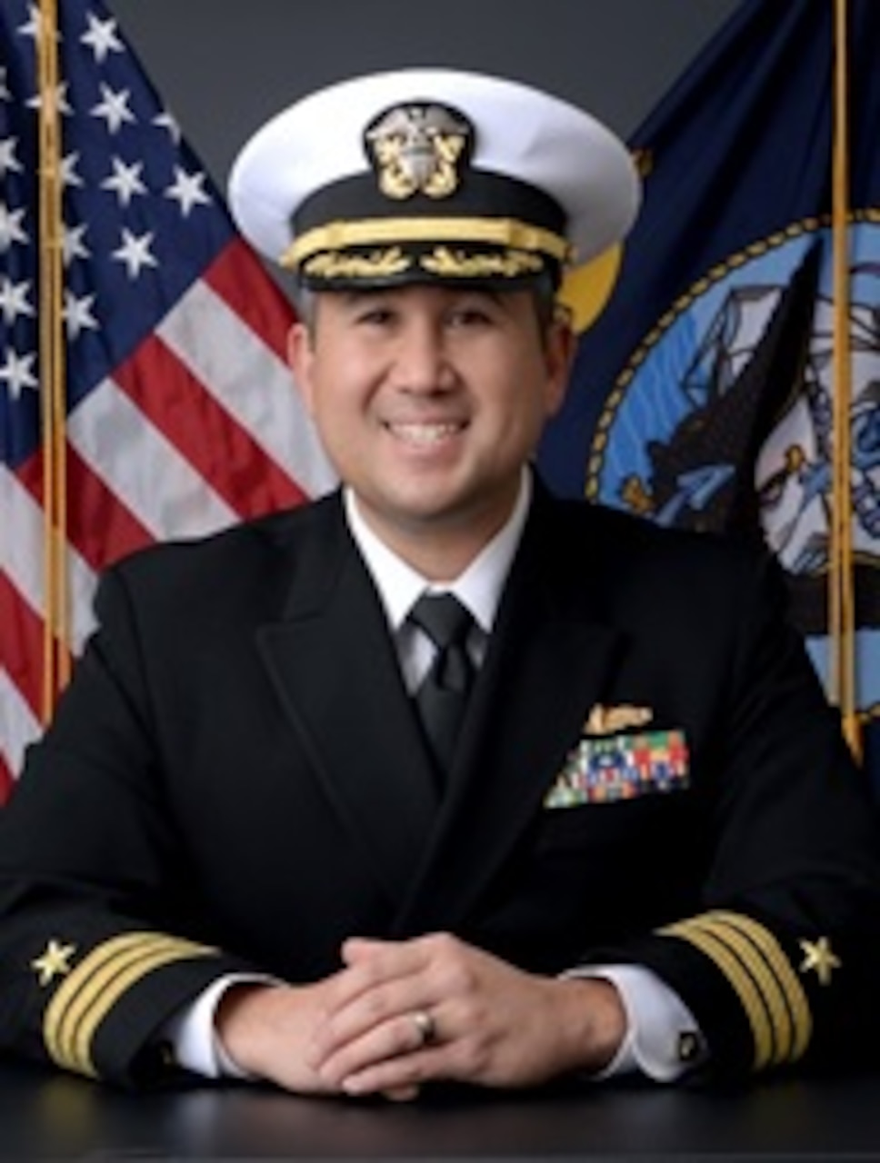 Commander Ryan R. Downing