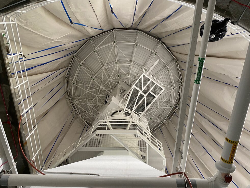 The 23rd Space Operations Squadron covers an antenna with a new radome at New Boston Space Force Station, New Hampshire, July 19, 2021. The squadron replaced the radome as it approached the end of its 20-year life expectancy. (Courtesy photo)