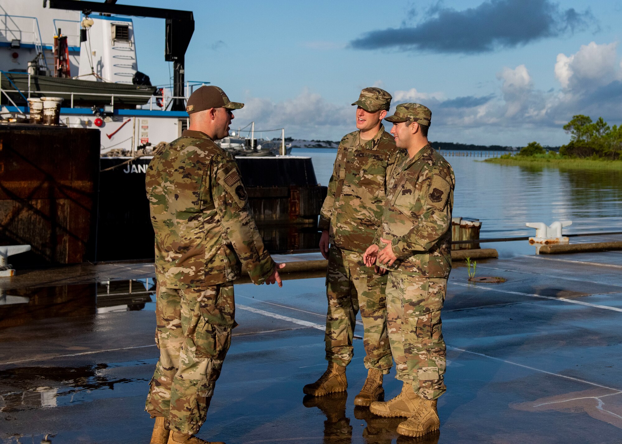 Master Sgt. Wesley Jones, fuels operations chief with the 419th Logistics Readiness Squadron, trains with Staff Sgt. Steven Miles and Staff Sgt. Joshua Guerrero, fuels journeymen with the 419th LRS, during their annual tour, July 21, 2021 at Hurlburt Field, Florida. The reservists observed a fuel barge defueling operation as training for real-world deployments.