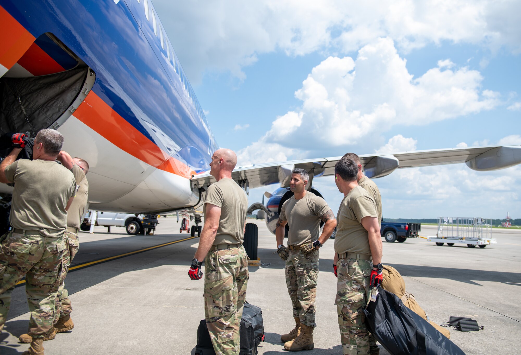 Reservists from the 419th Fighter Wing assist in loading 6,000 pounds of cargo on an airplane for personnel deploying from Hurlburt Field, Florida, July 23, 2021. The reservists were embedded with the 1st Special Operations Group for their two-week annual tour, working alongside active duty.