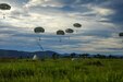 U.S. Army and Colombian joint military paratroopers land, July 25, 2021, at Tolemaida Air Base, Colombia. The jump was part of a six-day Dynamic Force Employment airborne exercise, also known as Exercise Hidra II, between the U.S Army and Colombian joint military.