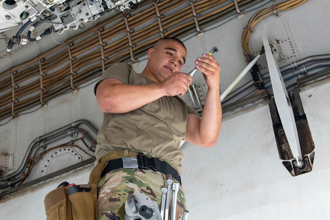 military member sets a torque wrench