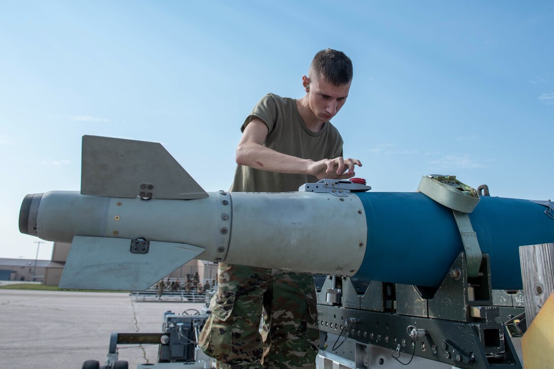 Military member preps explosives