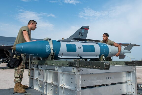 military members move explosive