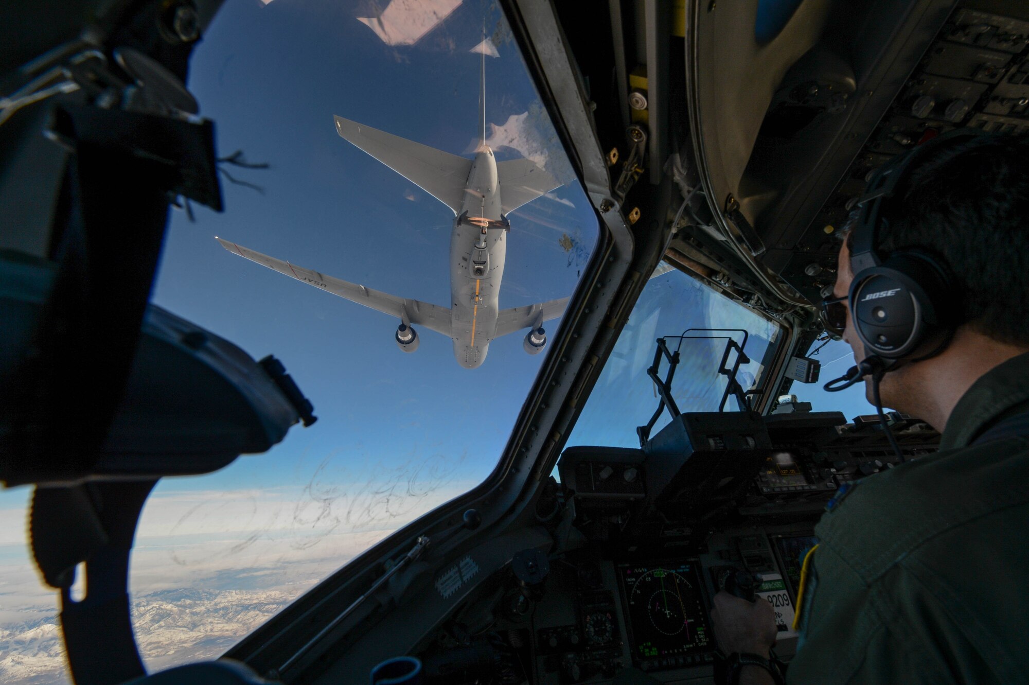 Capt. Wade Gallup, 7th Airlift Squadron pilot, approaches a KC-46 Pegasus during refueling training over central Wash., Jan. 30, 2019. With its multiple options the KC-46 can refuel Air Force, Navy, Marine Corps and partner nation aircraft. (U.S. Air Force photo by A1C Sara Hoerichs)