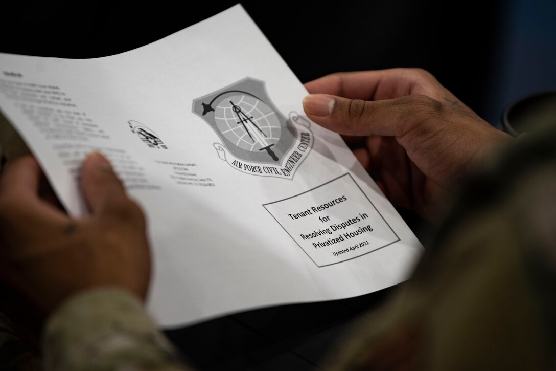 An Airman reads a paper.