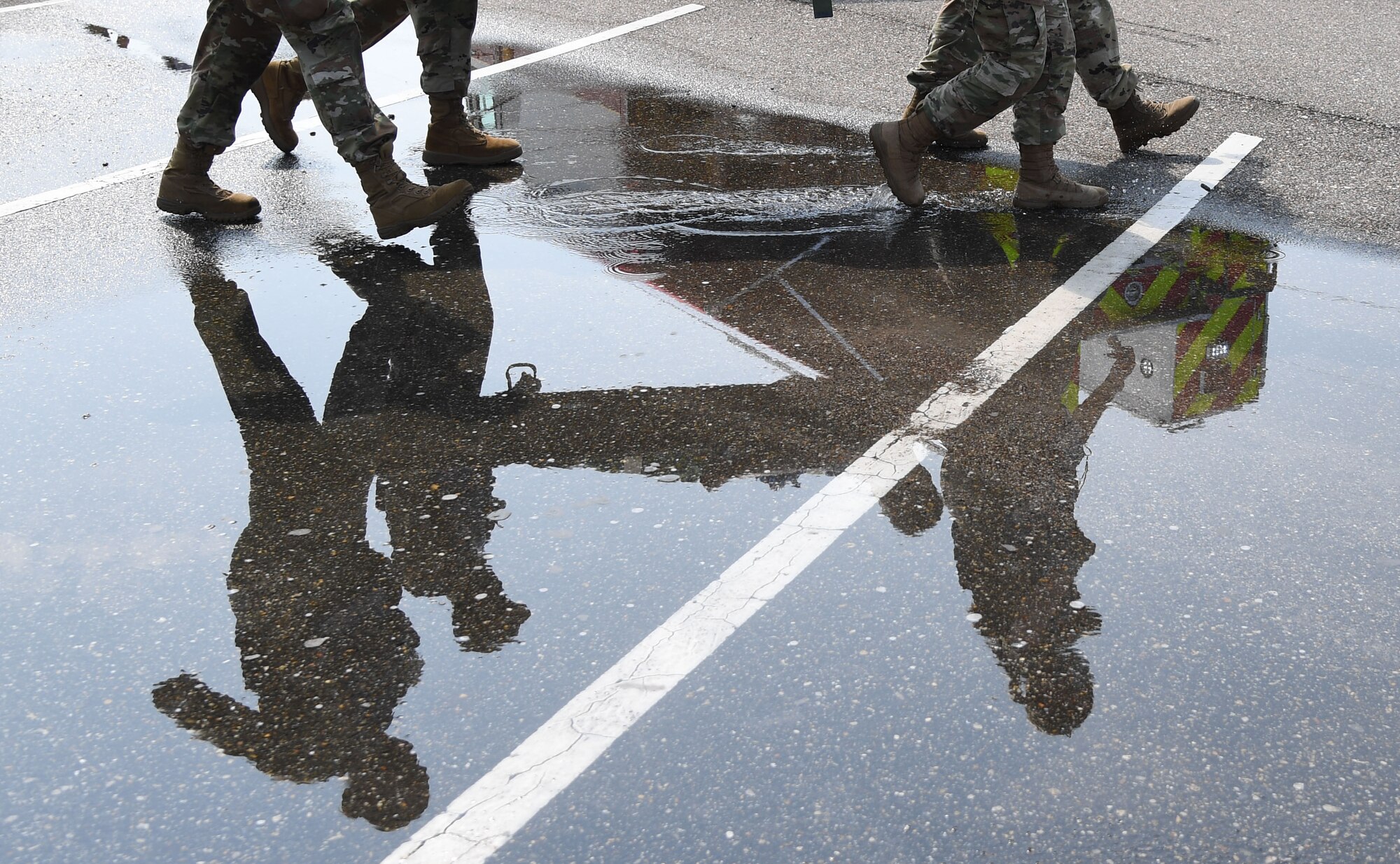 Members of the 81st Medical Group carries a "victim" to an ambulance during a Chemical, Biological, Radiological, Nuclear exercise at Keesler Air Force Base, Mississippi, Aug. 6, 2021. The Ready Eagle exercise tested the base's ability to respond to and recover from a mass casualty event. (U.S. Air Force photo by Kemberly Groue)