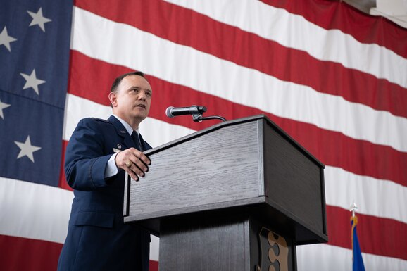 Col. Nathan Mitchell, the 28th Maintenance Group incoming commander, gives a speech during his change of command on Ellsworth Air Force Base, S.D., August 4, 2021.