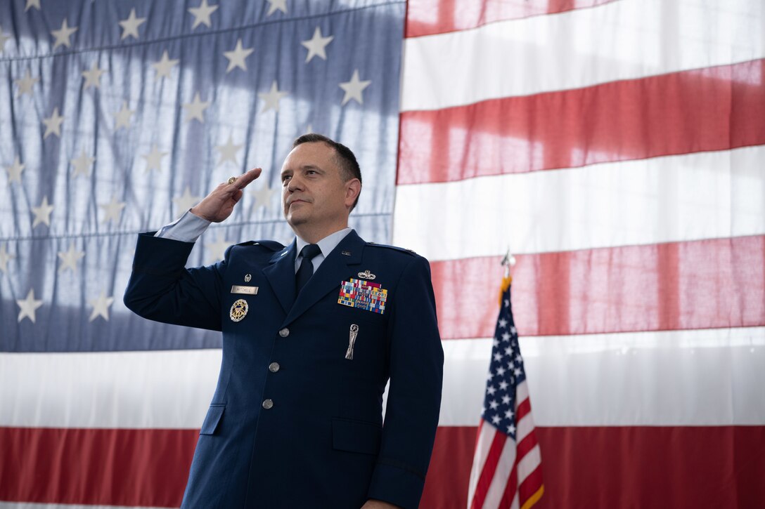 Col. Nathan Mitchell, 28th Maintenance Group incoming commander, renders his first salute to the 28th Maintenance Group on Ellsworth Air Force Base, S.D., August 4, 2021.