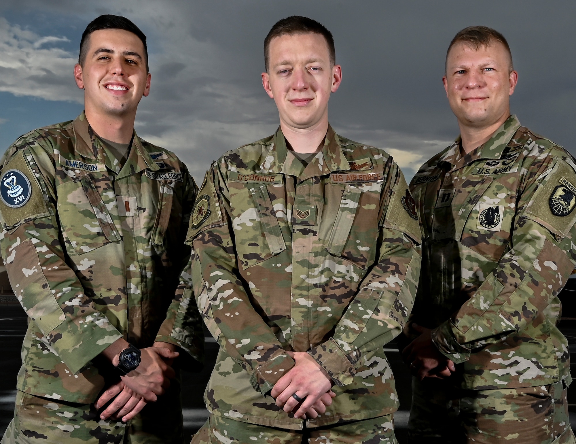 A group photo of civilian and military members