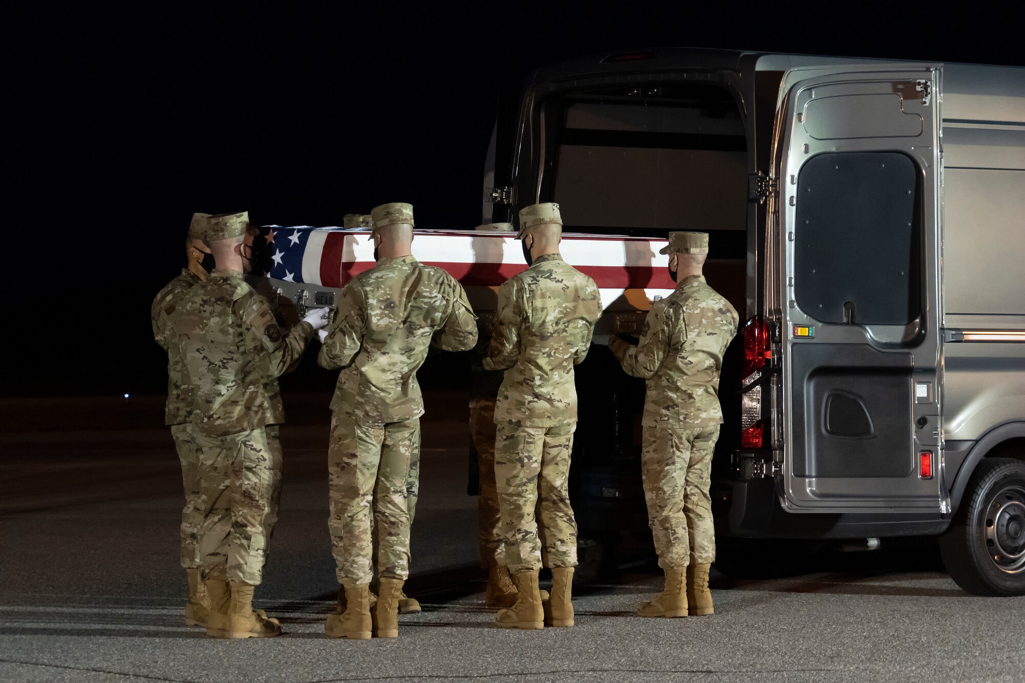 A U.S. Air Force carry team transfers the remains of Air Force Chief Master Sgt. Tresse Z. King of Raeford, North Carolina, August 6, 2021 at Dover Air Force Base, Delaware. King was assigned to the 96th Force Support Squadron, Eglin Air Force Base, Florida. (U.S. Air Force photo by Jason Minto)