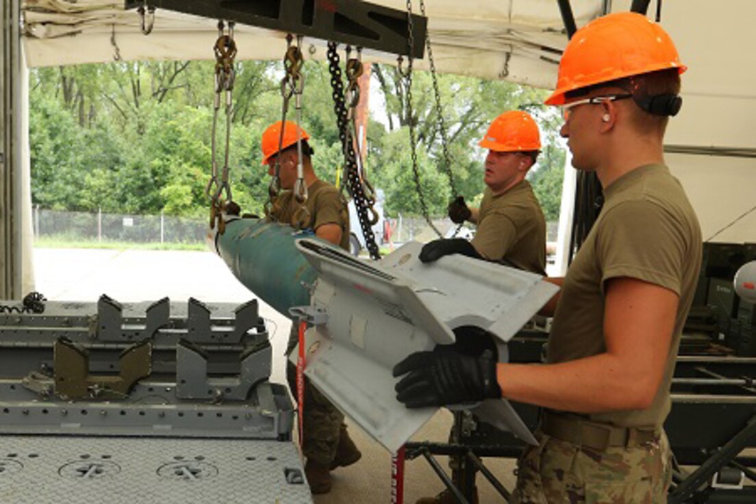 Airmen compete in the annual Ammo Rodeo, a two-week munitions training competition at Volk Field in Wisconsin July 28, 2021. About 50 U.S. Air Force Guard and Reserve members from units all over the country spent a week doing classroom work before competing in the bomb-building event.