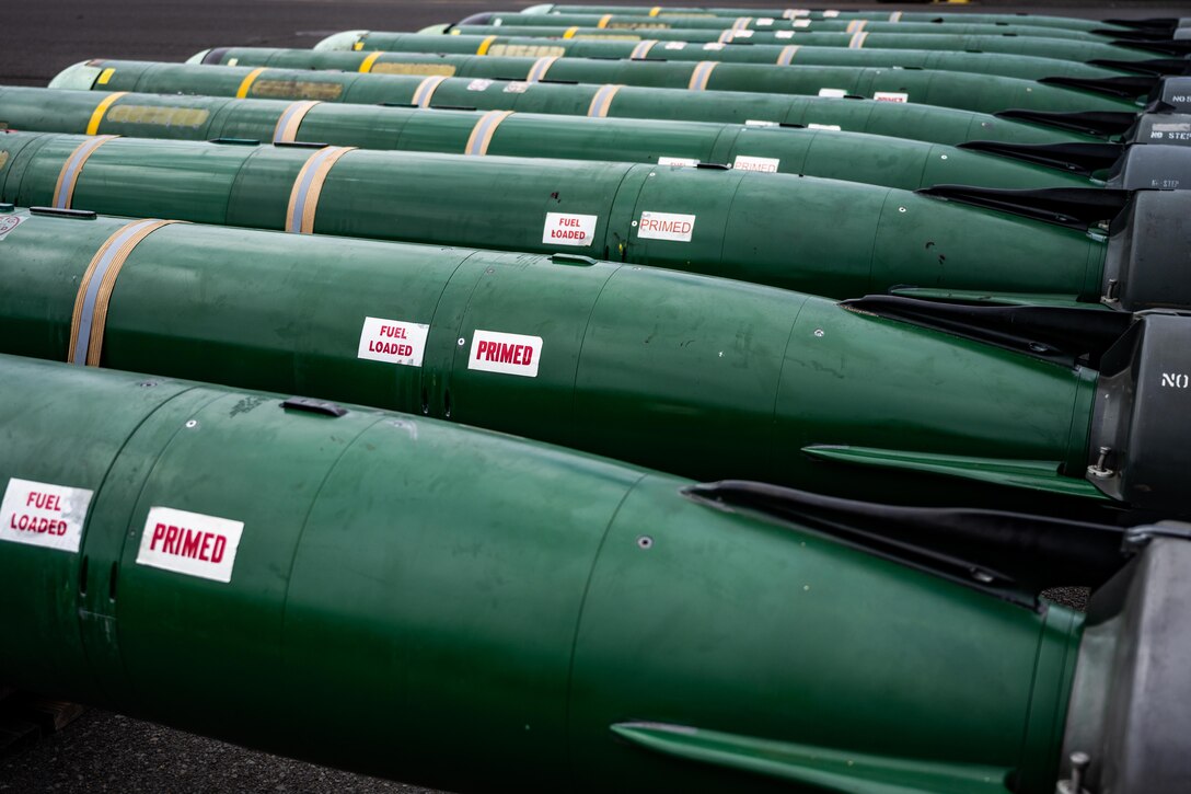 JOINT BASE PEARL HARBOR-HICKAM (July 28, 2021) -- Mark 48 Advanced Capability Torpedos waiting to get loaded onto submarines in preparation of Large-Scale Exercise (LSE) 2021. LSE 2021 is a live, virtual, and constructive, scenario-driven, globally integrated exercise that will provide high-end training at sea and ashore. (U.S. Navy photo by Mass Communication Specialist 1st Class Michael B. Zingaro/Released)