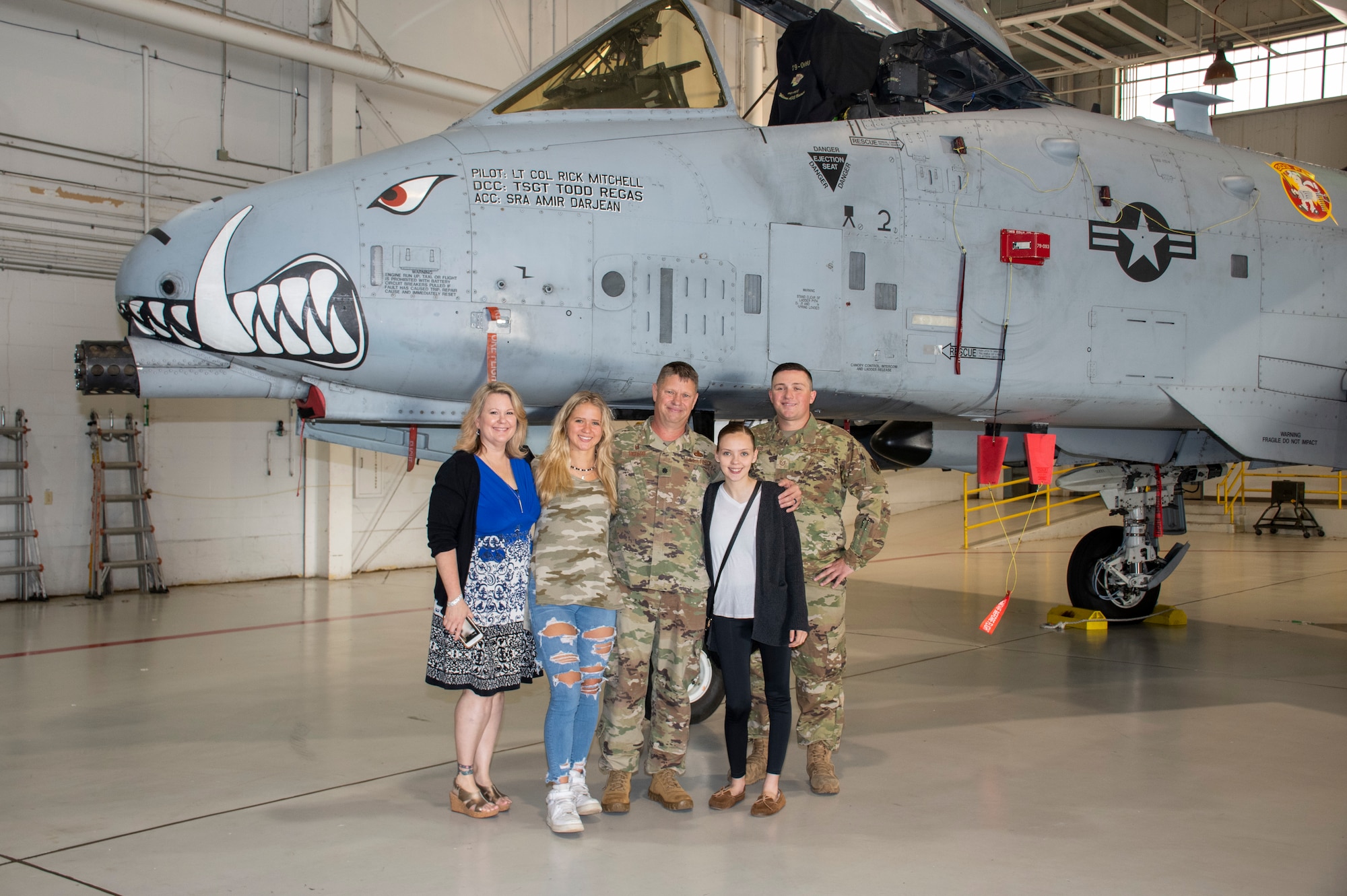 U.S. Air Force Lt. Col. William McLeod poses with his family after his assumption of command ceremony on Aug. 7, 2021 at Whiteman Air Force Base, Mo. (U.S. Air Force photo by Maj. Shelley Ecklebe)