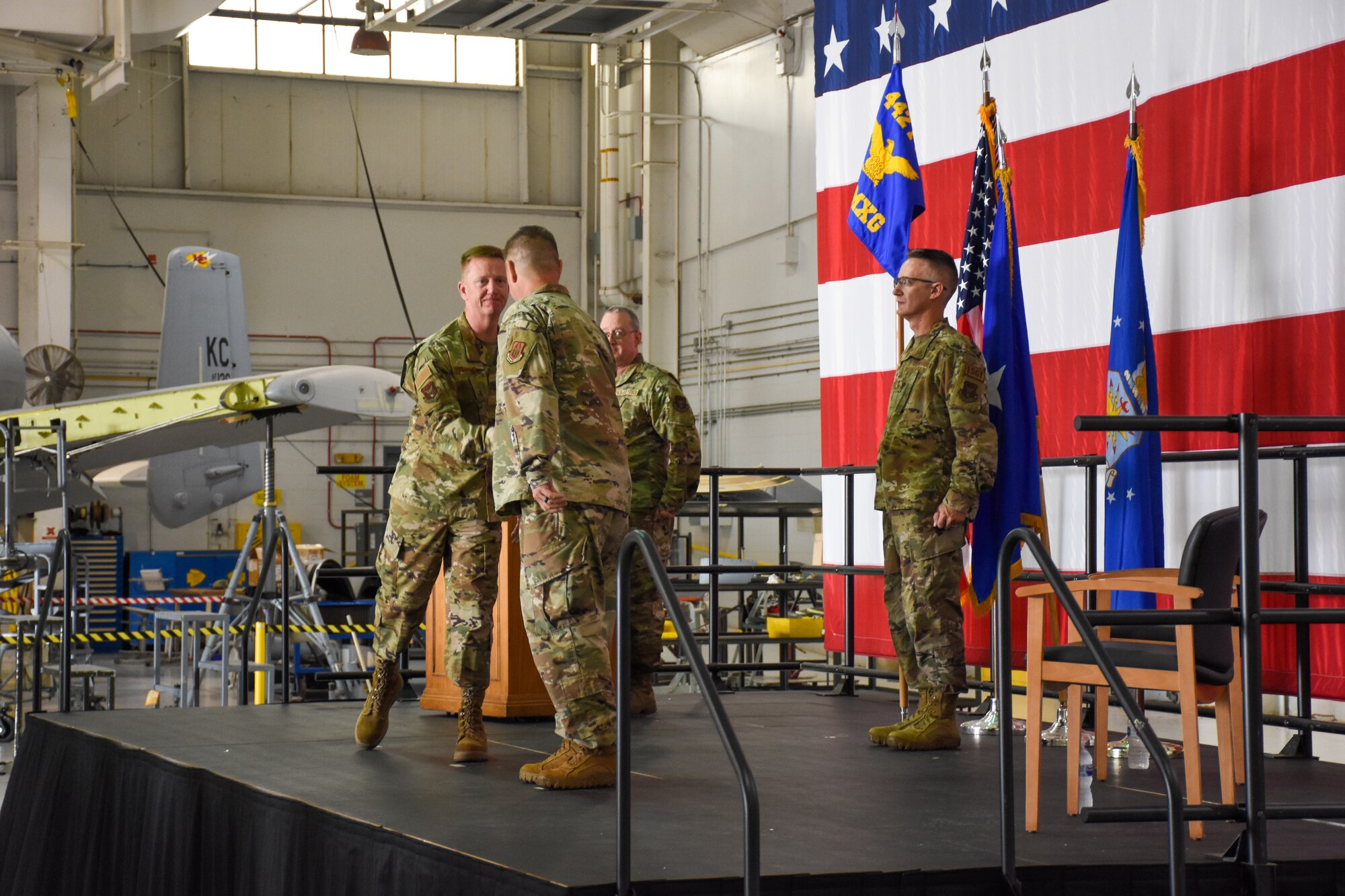 U.S. Air Force Brig. Gen. Michael Schultz, 442d Fighter Wing Commander, left, congratulates Lt. Col. William McLeod, in-coming 442d Maintenance Group Commander, during his assumption of command ceremony on Aug. 7, 2021 at Whiteman Air Force Base, Mo. (U.S. Air Force photo by Master Sgt. Robert Jennings)