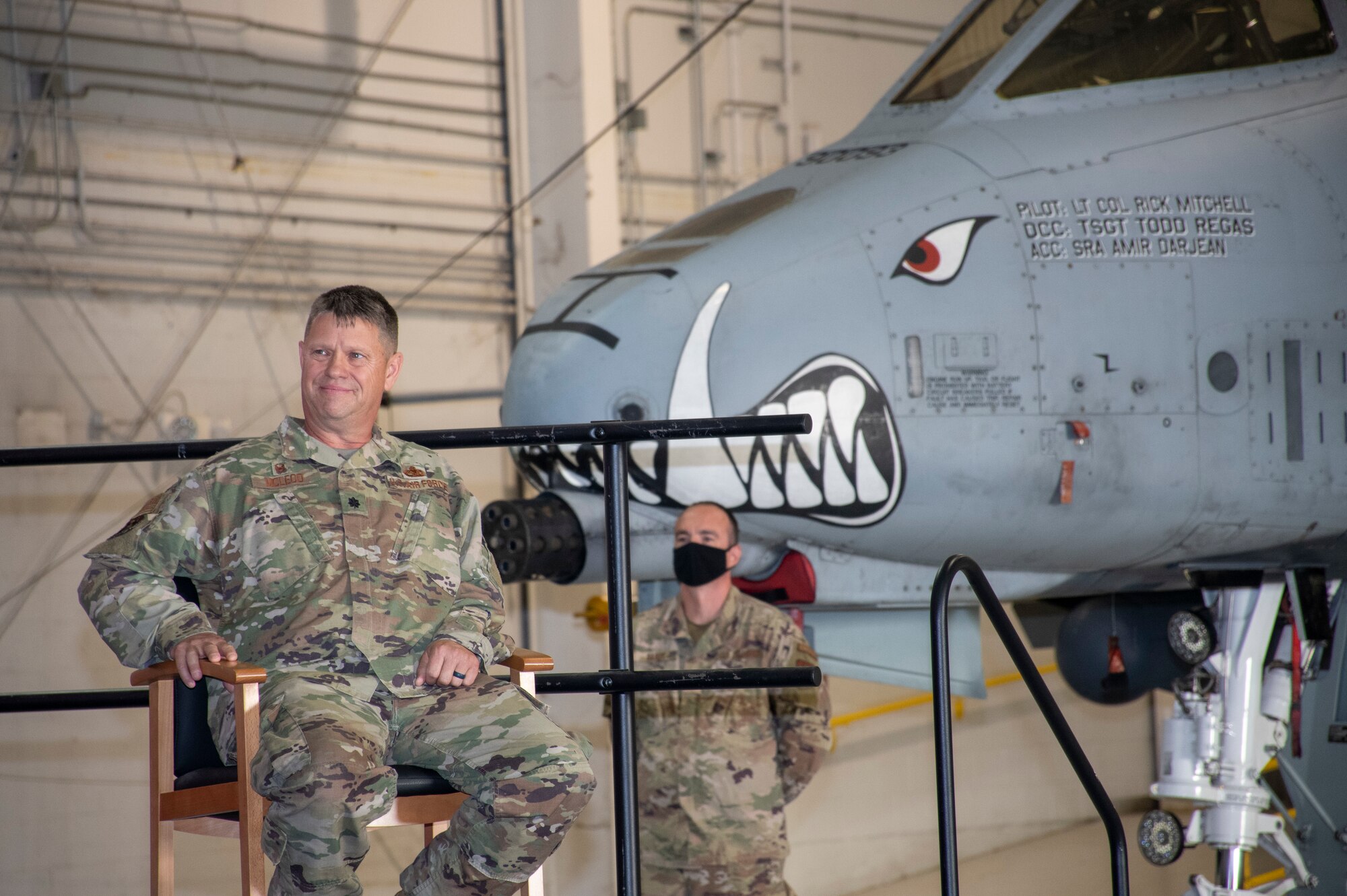 U.S. Air Force Lt. Col. William McLeod listens to Brig. Gen. Michael Schultz's speech during his assumption of command on Aug. 7, 2021 at Whiteman Air Force Base, Mo. (U.S. Air Force photo by Maj. Shelley Ecklebe)