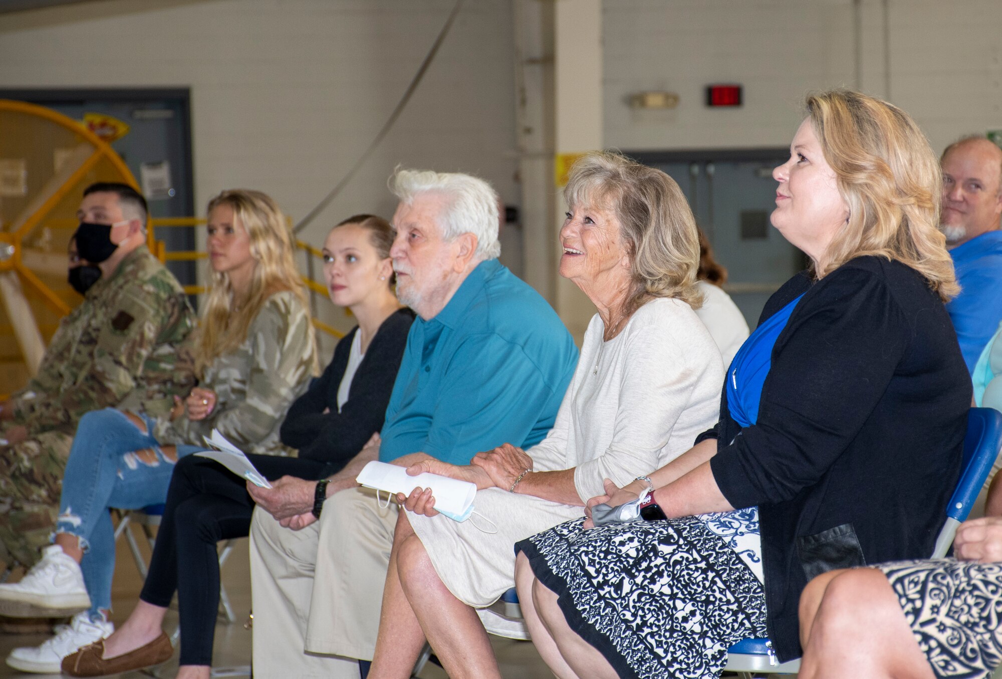 U.S. Air Force Lt. Col. McLeod's wife and mother listen to his assumption of command speech on Aug. 7, 2021 at Whiteman Air Force Base, Mo. (U.S. Air Force photo by Maj. Shelley Ecklebe)