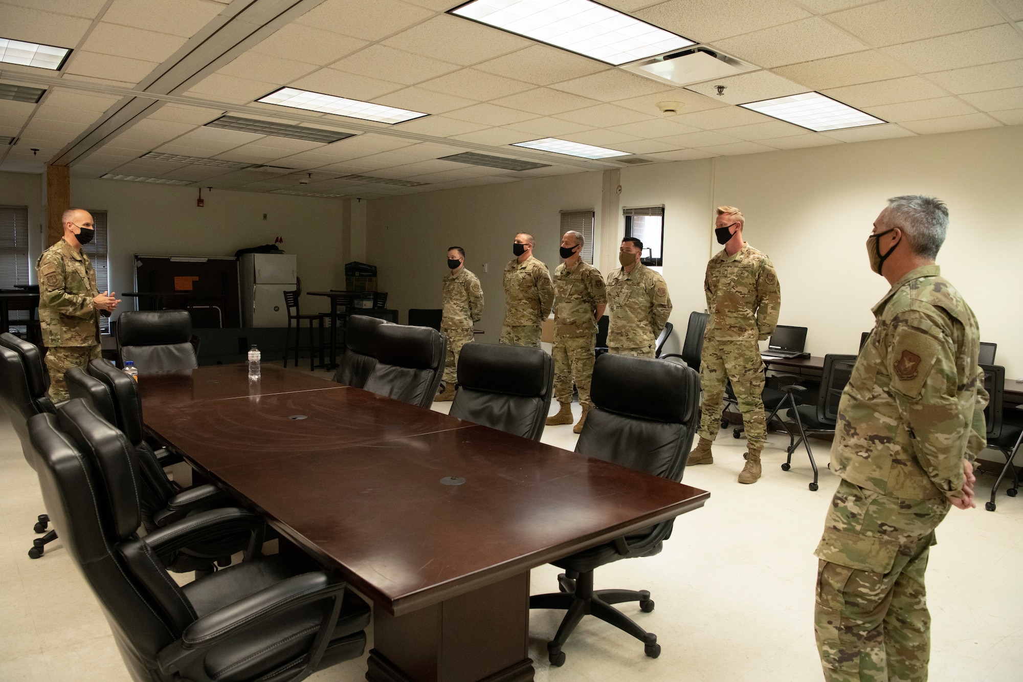 Col. Christopher Zidek, 302nd Airlift Wing commander, and Chief Master Sgt. Kahn Scalise, 302 AW command chief, congratulates reservists with the 302nd Maintenance Group Quality Assurance for winning the 2020 Air Force Reserve Command Logistics Readiness and Maintenance Award
