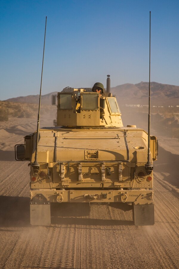 U.S. Marines with Combat Logistics Battalion (CLB) 25 conduct a Motorized Fire and Maneuver Exercise (MFME) during Integrated Training Exercise (ITX) 4-21 at Range 114 on Marine Corps Air Ground Combat Center, Twentynine Palms, California on August 3rd, 2021. The MFME challenges Marines to conduct a live-fire convoy confronted by an unblocked ambush, ensuring Marines from CLB 25 remain combat-ready as they continue to provide vital support to Marine Air Ground Task Force 25 during ITX. (U.S. Marine Corps photo by Lance Cpl. Samwel Tabancay)