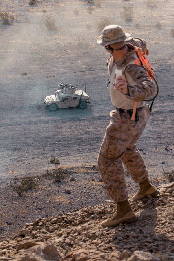 U.S. Marines with Combat Logistics Battalion (CLB) 25 conduct a Motorized Fire and Maneuver Exercise (MFME) during Integrated Training Exercise (ITX) 4-21 at Range 114 on Marine Corps Air Ground Combat Center, Twentynine Palms, California on August 3rd, 2021. The MFME challenges Marines to conduct a live-fire convoy confronted by an unblocked ambush, ensuring Marines from CLB 25 remain combat-ready as they continue to provide vital support to Marine Air Ground Task Force 25 during ITX. (U.S. Marine Corps photo by Lance Cpl. David Intriago)