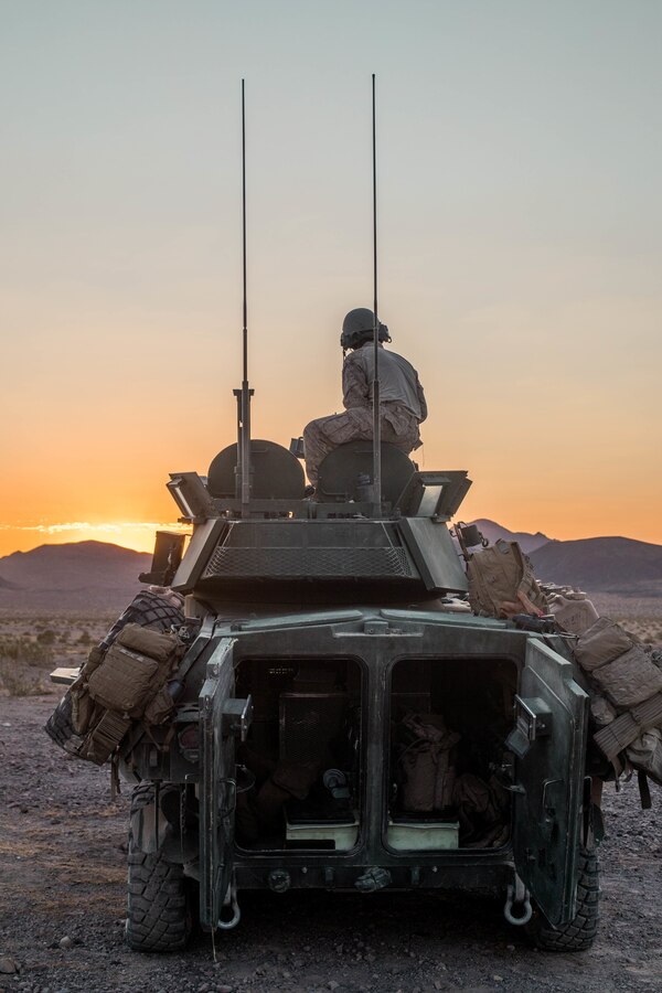 Lance Cpl. Andrew Kim, an LAV-25 driver with Delta Company, 4th Light Armored Reconnaissance Battalion (LAR), 4th Marine Division, prepares for platoon attacks during Integrated Training Exercise (ITX) 4-21 at Marine Corps Air Ground Combat Center, Twentynine Palms, California on Aug. 2, 2021. ITX is the culmination of Marine Forces Reserve units’ training cycle as they participate in a live-fire, combined arms exercise as a part of an integrated Marine Air Ground Task Force. (U.S Marine Corps photo by Lance Cpl. David Intriago)
