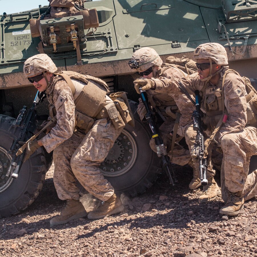 U.S. Marines with Delta Company, 4th Light Armored Reconnaissance Battalion (LAR), 4th Marine Division, prepare to move while conducting a platoon attack during Integrated Training Exercise (ITX) 4-21 at Marine Corps Air Ground Combat Center, Twentynine Palms, California on Aug. 2, 2021. ITX is the culmination of Marine Forces Reserve units’ training cycle as they participate in a live-fire, combined arms exercise as a part of an integrated Marine Air Ground Task Force. (U.S Marine Corps photo by Lance Cpl. David Intriago)