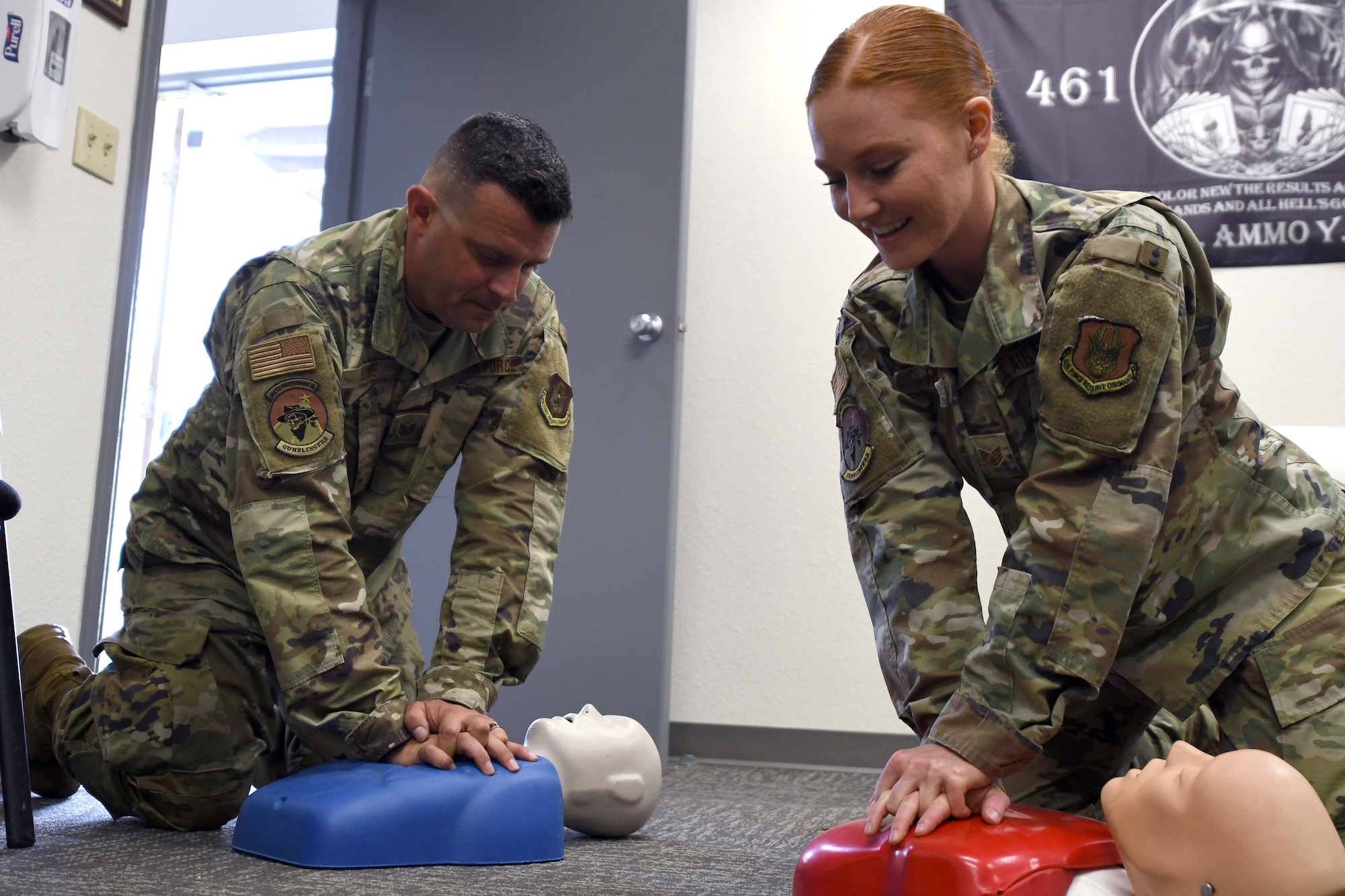 U.S. Air Force Staff Sgt. Kristy Riley, 924th Maintenance Squadron Munitions Flight combat plans training supervisor, teaches proper CPR procedures at Davis-Monthan Air Force Base, Arizona, July 23, 2021. Riley was named one of the Air Force’s 12 Outstanding Airmen of the Year and was recently nominated for the Air Force Sergeants Association's Pitsenbarger Award. (U.S. Air Force photo by Staff Sgt. Blake Gonzales)