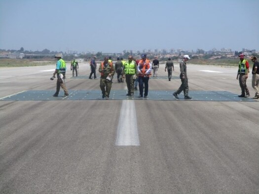 Engineers check a runway repair
