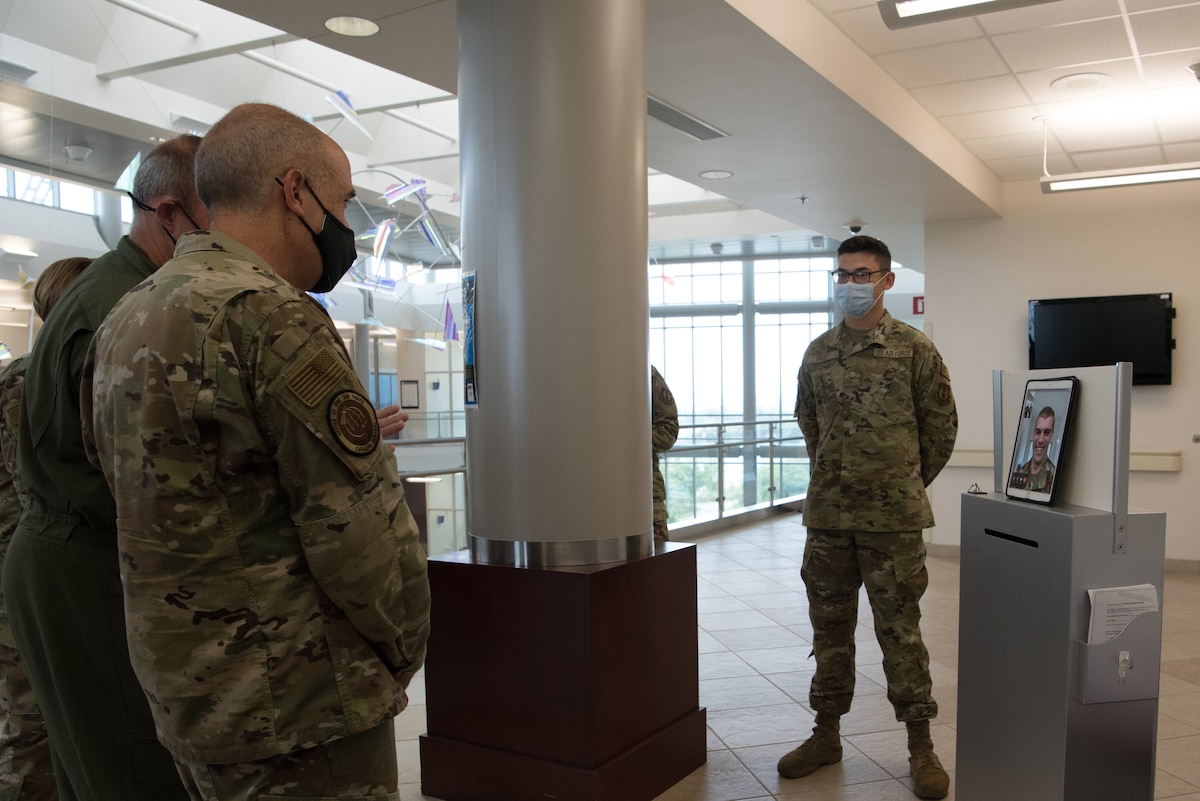 Lt. Gen. Miller teleconferencing with Airman via tablet
