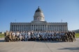 Freedom Academy delegates pose in front of the Utah State Capitol building