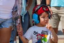 Elijah Mills waits on his father, Maj. Andrew Mills, 16th Airlift Squadron pilot, to return from his deployment at Joint Base Charleston, S.C., Aug. 8, 2021.