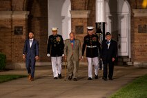 Marines with “The President’s Own, U.S. Marine Band perform during a Friday Evening Parade at Marine Barracks Washington, Aug. 6, 2021.