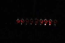 Marines with “The Commandant’s Own,” U.S. Marine Drum and Bugle Corps execute “fanfare” during a Friday Evening Parade at Marine Barracks Washington, Aug. 6, 2021.