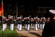 Marines with the Silent Drill Platoon perform during a Friday Evening Parade at Marine Barracks Washington, Aug. 6, 2021.