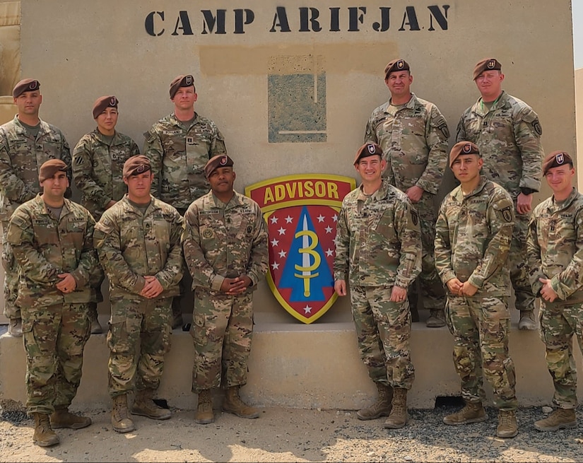 Soldiers assigned to 1st Battalion, 3rd Security Force Assistance Brigade stand for a group photo at Camp Arifjan, Kuwait.