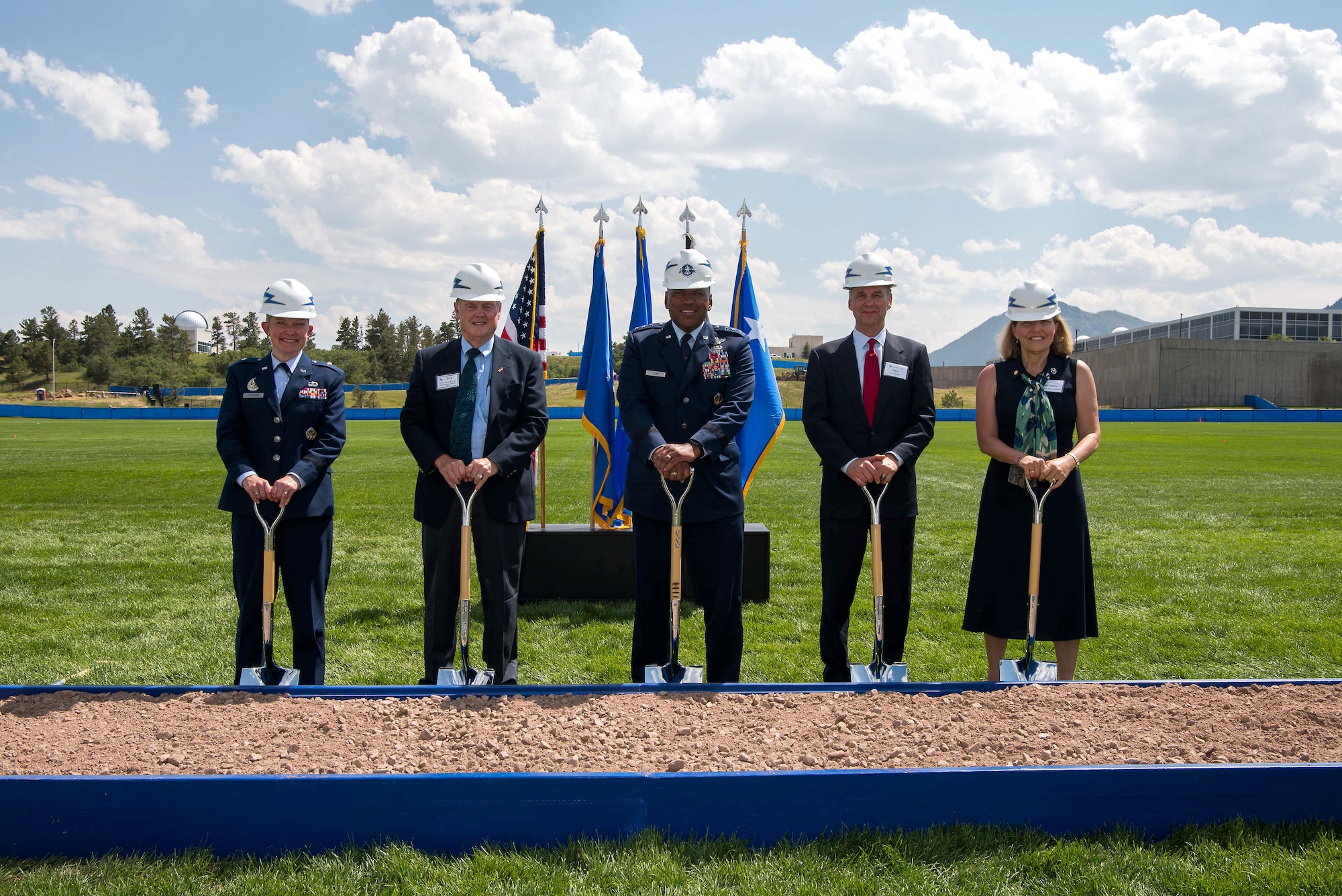 Lt. Gen. Richard Clark, U.S. Air Force Academy superintendent (center), joins senior officials for a photo during a ceremony to recognize the Madera Cyber Innovation Center’s ground-breaking on Stillman Parade Field