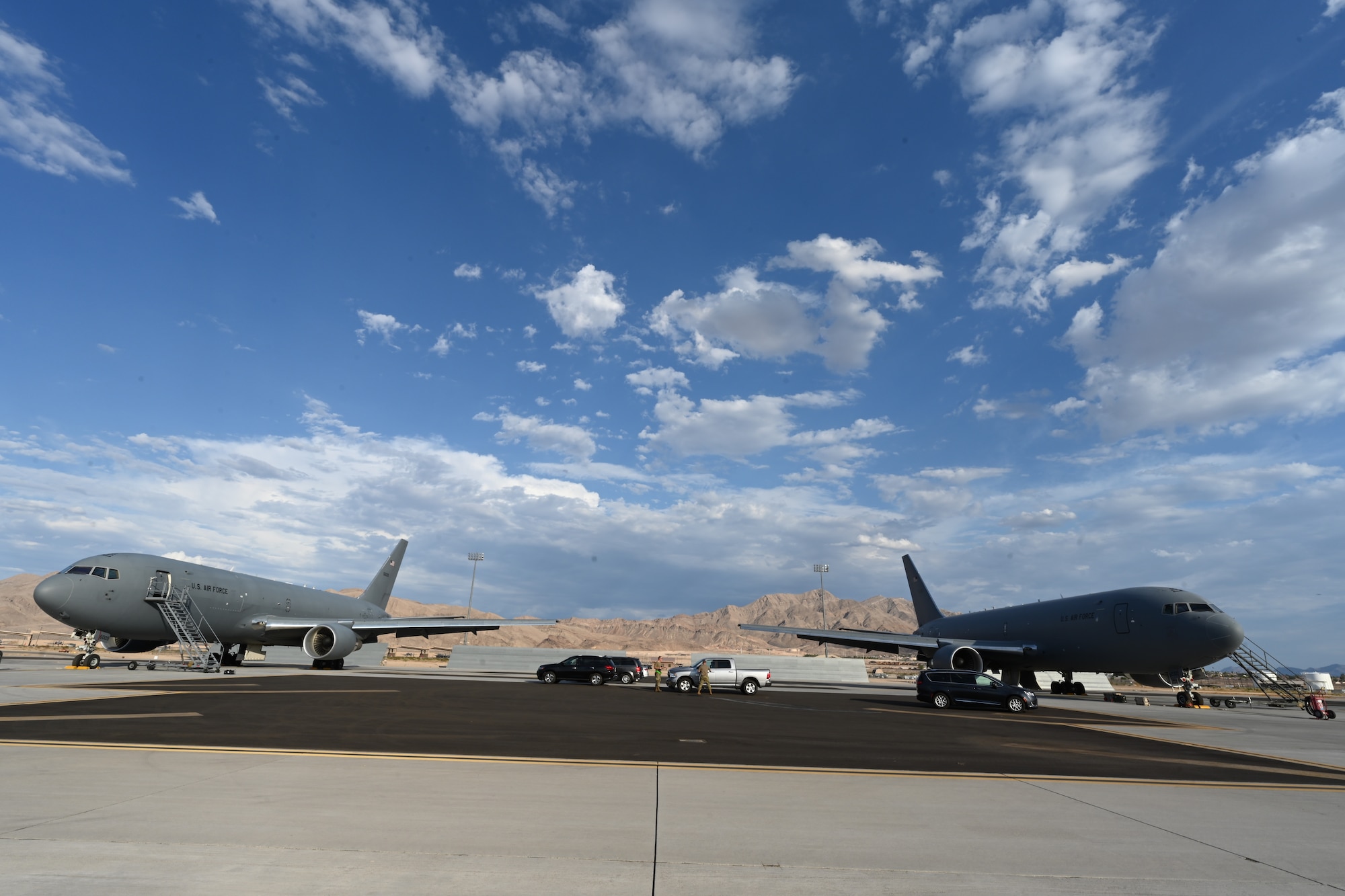 Airmen from the 22nd and 931st Aircraft Maintenance Squadrons perform inspections on two KC-46A Pegasus’ July 20, 2021, at Nellis Air Force Base, Nevada.