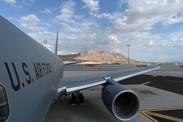 A KC-46A Pegasus from McConnell undergoes pre-flight inspections on the airfield July 20, 2021, at Nellis Air Force Base, Nevada.