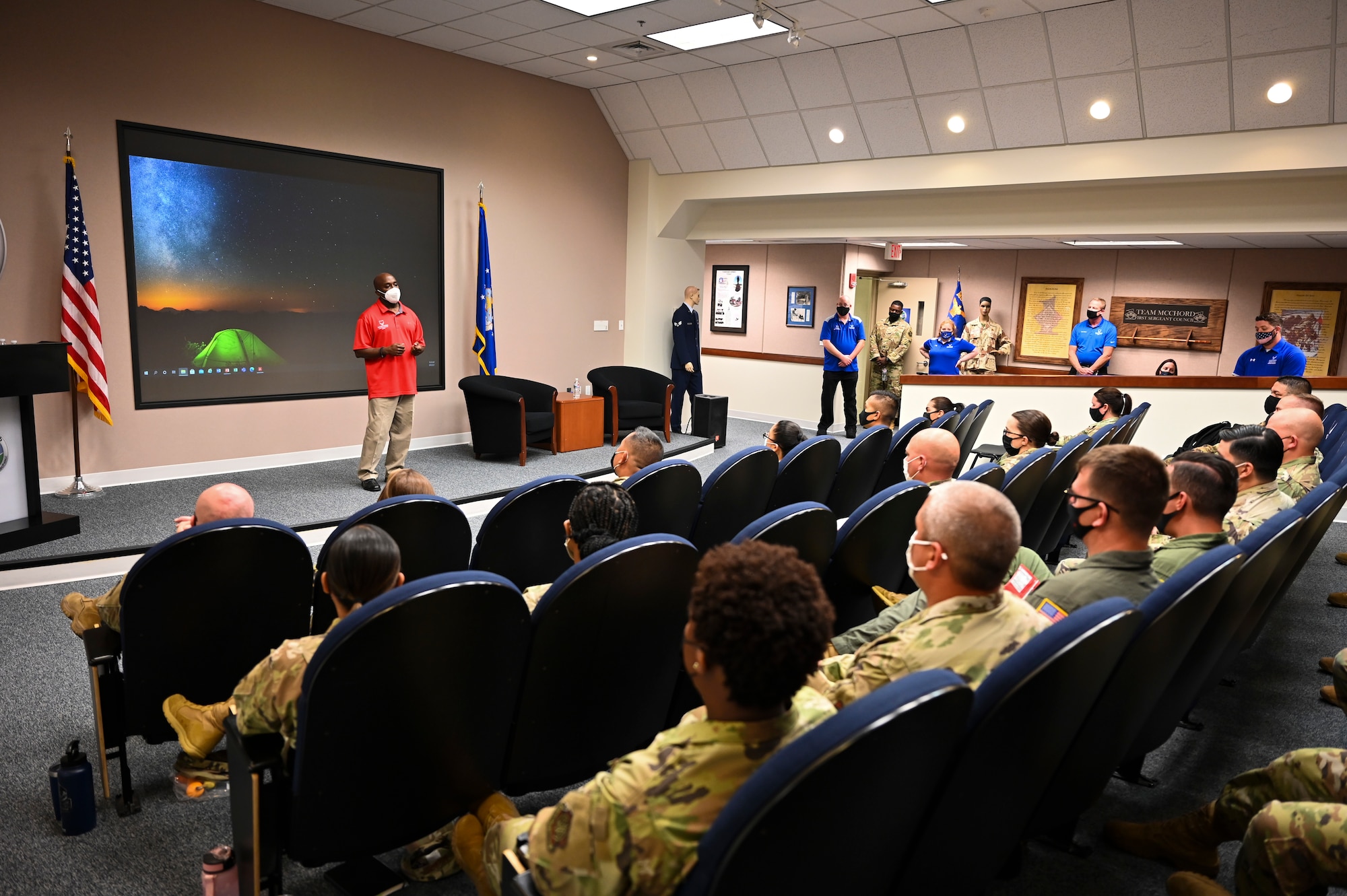 Ronald Johnson, Air Force Wounded Warrior Program (AFW2) quality assurance and Airman for Life section lead, talk about AFW2 during the AFW2 Ambassador Roadshow event at Joint Base Lewis-McChord, Wash., Aug. 9, 2021. The event provided the AFW2 team an opportunity to educate the Air Force population about support programs such as Adaptive Sports, Empowerment in Transition, Wellness & Resiliency, Airman 4 Life, Community Programs and more that help navigate the warrior’s care. (U.S. Air Force photo by Master Sgt. Julius Delos Reyes)