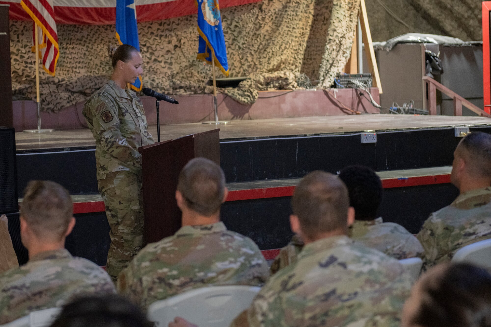 A U.S. Airman speaks to an audience
