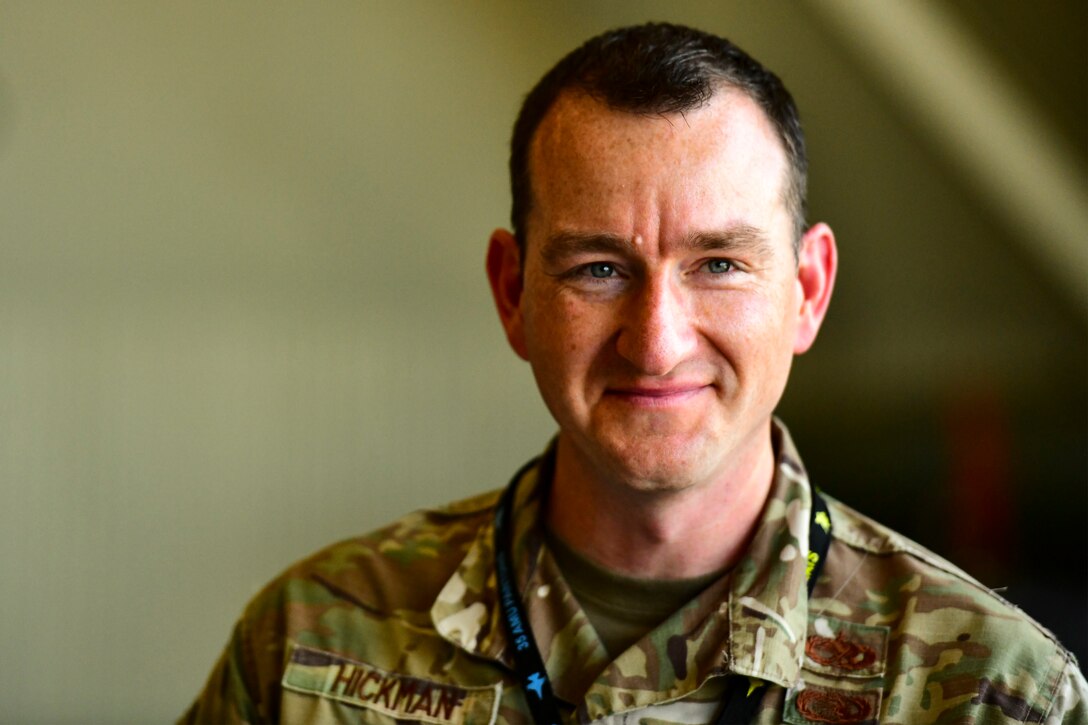 An Airman smiles in a photo.