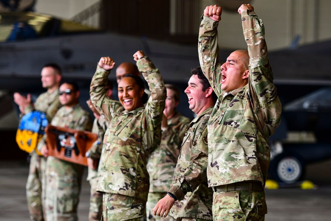 Airmen celebrate during a competition.