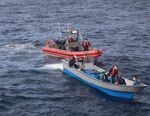 A Coast Guard Cutter James (WMSL-754) 26-foot Over The Horizon (OTH) pursuit crew and a cutter James 35-foot Long Range Interceptor boat crew interdict a 26-foot smuggling panga with three suspected smugglers aboard in the Eastern Pacific Ocean Tuesday, Nov. 22, 2020. Cutter James is a National Security Cutter with robust capabilities for maritime homeland security, law enforcement and national defense missions. (U.S. Coast Guard photo by Petty Officer 3rd Class Erik Villa Rodriguez)