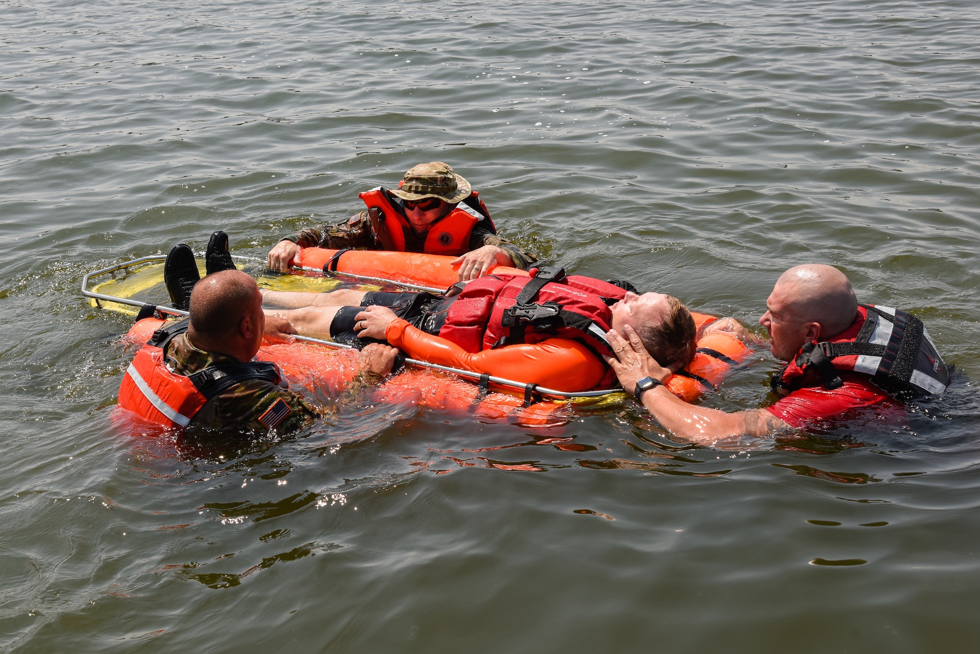 Tennessee National Guardsman work with members of the Williamson County Emergency Management Agency during a water rescue exercise, August 5, at Old Hickory Lake, during Vigilant Guard 2021, a large-scale inter-agency exercise simulating a dangerous hurricane impacting communities across Tennessee.