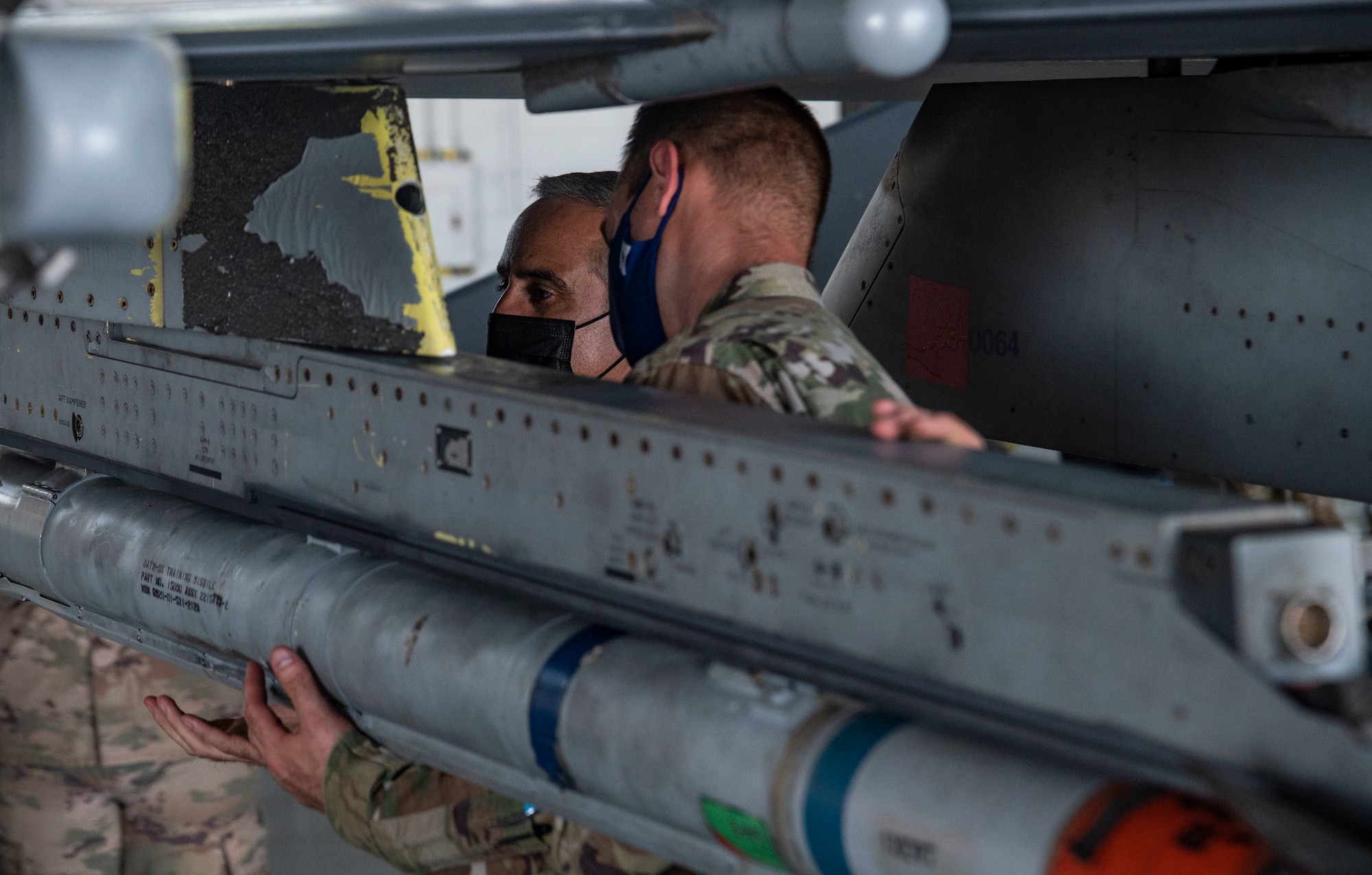 Photo of leadership talking to Airmen